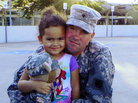 This July 21, 2013, photo provided by Shannon Jones, attorney for Dusten Brown, shows Brown with his daughter, Veronica. This July 21, 2013, photo provided by Shannon Jones, attorney for Dusten Brown, shows Brown with his daughter, Veronica.