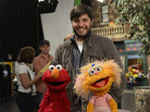 Sesame Street music director Bill Sherman with Elmo and Zoe on the set. Sherman won a Tony Award for In the Heights in 2008 and has recruited Broadway peers to compose for the children's show. Sesame Street music director Bill Sherman with Elmo and Zoe on the set. Sherman won a Tony Award for In the Heights in 2008 and has recruited Broadway peers to compose for the children's show.