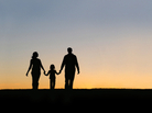 Silhouette of parents and child. Silhouette of parents and child.