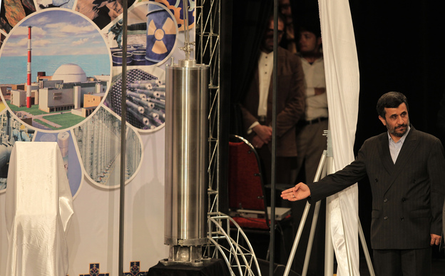 Former Iranian President Mahmoud Ahmadinejad unveils a sample of the third generation centrifuge during a ceremony to mark the National Nuclear Day in Tehran on March 9, 2010. (Image credit: AFP/Getty Images)