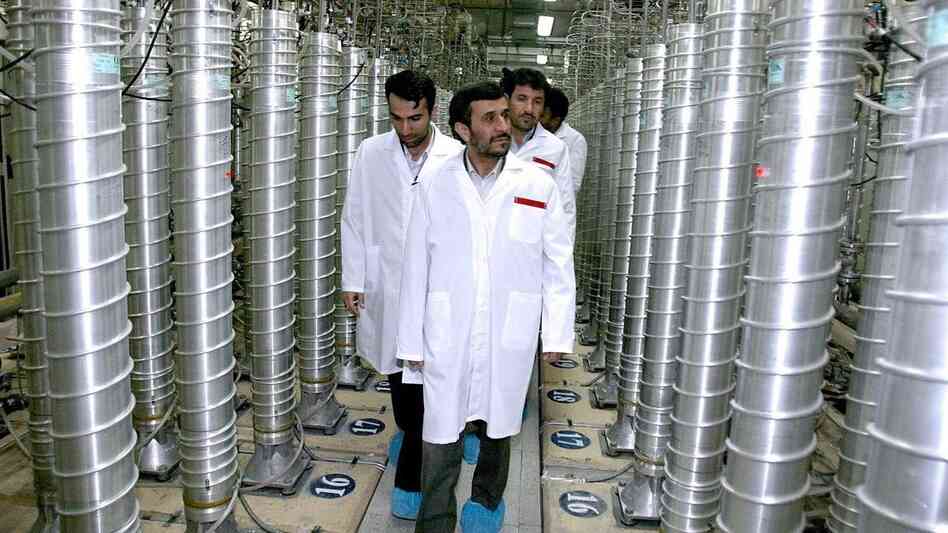 Former Iranian President Mahmoud Ahmadinejad inspects the Natanz nuclear plant in central Iran on March 8, 2007. The tall cylinders are centrifuges for enriching uranium. Former Iranian President Mahmoud Ahmadinejad inspects the Natanz nuclear plant in central Iran on March 8, 2007. The tall cylinders are centrifuges for enriching uranium.