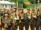 Members of the Kachin Independence Army train at a refugee camp in northern Myanmar. Members of the Kachin Independence Army train at a refugee camp in northern Myanmar.