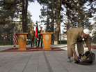 Ahead of an expected — and repeatedly delayed — news conference, an Afghan worker leaves the area where Secretary of State John Kerry and Afghan President Hamid Karzai were expected to speak Saturday in Kabul. Ahead of an expected — and repeatedly delayed — news conference, an Afghan worker leaves the area where Secretary of State John Kerry and Afghan President Hamid Karzai were expected to speak Saturday in Kabul.