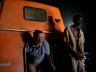Tom Hanks and Barkhad Abdirahman share close quarters in Captain Phillips. Tom Hanks and Barkhad Abdirahman share close quarters in Captain Phillips.