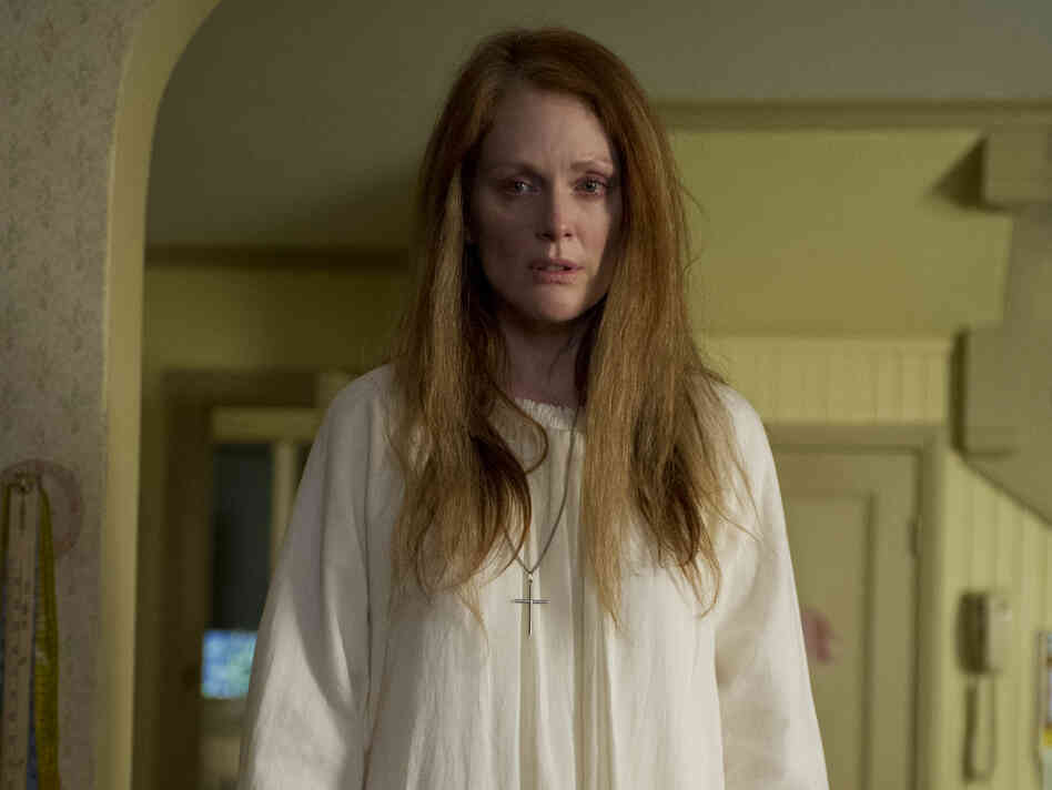 Julianne Moore takes on the problematic-parent in the remake — complete with long wild hair and a white nightgown reminiscent of Piper Laurie's in the original film. Julianne Moore takes on the problematic-parent in the remake — complete with long wild hair and a white nightgown reminiscent of Piper Laurie's in the original film.