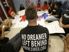 Demonstrators supporting an immigration overhaul stage a sit-down protest at the offices of Rep. Mario Diaz-Balart, R-Fla., on Oct. 11. Demonstrators supporting an immigration overhaul stage a sit-down protest at the offices of Rep. Mario Diaz-Balart, R-Fla., on Oct. 11.