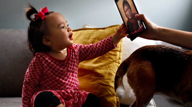 Eva Hu-Stiles virtually interacts with her grandmother. iPad assist by Elise Hu-Stiles. (NPR)