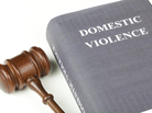 Gavel and book on domestic violence Gavel and book on domestic violence
