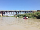 Kayakers head out on the Rio Grande toward one of the international bridges that connect Laredo, Texas, and the town of Nuevo Laredo in Mexico. Raw sewage and animal carcasses float in the water. Kayakers head out on the Rio Grande toward one of the international bridges that connect Laredo, Texas, and the town of Nuevo Laredo in Mexico. Raw sewage and animal carcasses float in the water.
