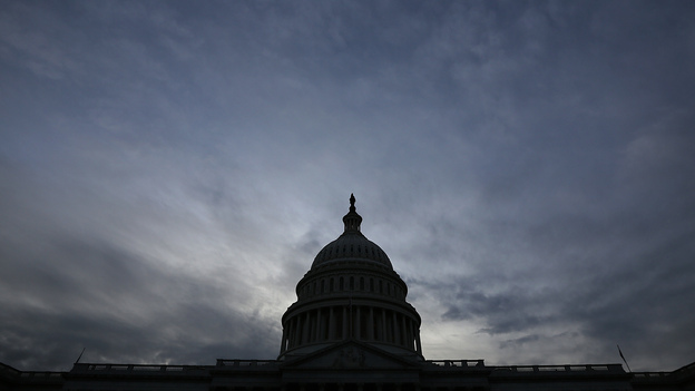 The U.S. Capitol is shown at sunset on Oct. 15, the 15th day of a government shutdown that some analysts say damaged the U.S. reputation worldwide. (Image credit: Getty Images)