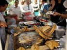 A street vendor fries food for lunch customers in Mexico City on July 10. Mexico has now surpassed the United States in levels of adult obesity, according to the U.N. Food and Agriculture Organization. A street vendor fries food for lunch customers in Mexico City on July 10. Mexico has now surpassed the United States in levels of adult obesity, according to the U.N. Food and Agriculture Organization.