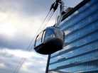 Commuters headed to Oregon Health and Science University use cars, bikes and streetcars to connect with Portland's aerial tram, which whisks them up and over south waterfront neighborhoods. Commuters headed to Oregon Health and Science University use cars, bikes and streetcars to connect with Portland's aerial tram, which whisks them up and over south waterfront neighborhoods.