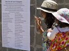 Relatives of Westgate attack victim Mitul Shah observe a list of names of some of those who died at a memorial service marking one month since the Sept. 21 terrorist attack in Nairobi, Kenya, on Monday. Relatives of Westgate attack victim Mitul Shah observe a list of names of some of those who died at a memorial service marking one month since the Sept. 21 terrorist attack in Nairobi, Kenya, on Monday.