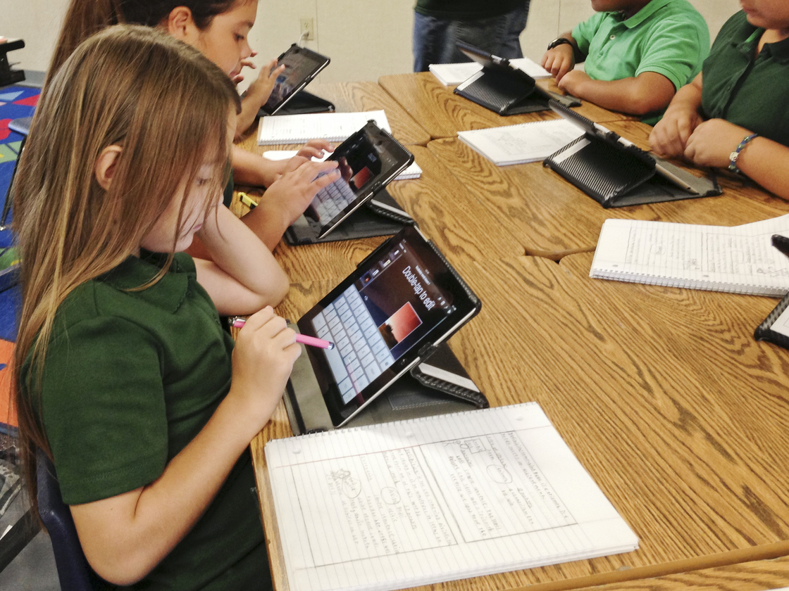 Students at Coachella Valley Unified School District use iPads during a lesson. The district's superintendent is promoting the tablet initiative as a way to individualize learning.
