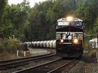 A Norfolk Southern train pulls oil tank units on its way to the PBF Energy refinery in Delaware City, Del. As U.S. oil production outpaces its pipeline capacity, more and more companies are looking to the railways to transport crude oil. A Norfolk Southern train pulls oil tank units on its way to the PBF Energy refinery in Delaware City, Del. As U.S. oil production outpaces its pipeline capacity, more and more companies are looking to the railways to transport crude oil.