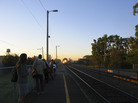 Reverse commuters, include Kathy LeVeque (in the foreground), wait for an approaching outbound Metra commuter train at the Mayfair neighborhood stop on Chicago's northwest side. Reverse commuters, include Kathy LeVeque (in the foreground), wait for an approaching outbound Metra commuter train at the Mayfair neighborhood stop on Chicago's northwest side.
