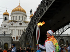 One of the participants of the Sochi 2014 Winter Olympic torch relay runs near the Christ the Savior Cathedral in Moscow, on Oct. 8. Controversies surrounding costs, security and gay rights swirl around the games, to be held in the Russian Black Sea resort city. One of the participants of the Sochi 2014 Winter Olympic torch relay runs near the Christ the Savior Cathedral in Moscow, on Oct. 8. Controversies surrounding costs, security and gay rights swirl around the games, to be held in the Russian Black Sea resort city.