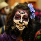 A woman disguised as "Catrina" poses for a photo in Guadalajara, Mexico. La Catrina is the Mexican representation of death, created 100 years ago by Mexican artist Jose Guadalupe Posada. A woman disguised as "Catrina" poses for a photo in Guadalajara, Mexico. La Catrina is the Mexican representation of death, created 100 years ago by Mexican artist Jose Guadalupe Posada.