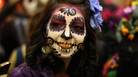 A woman disguised as "Catrina" poses for a photo in Guadalajara, Mexico. La Catrina is the Mexican representation of death, created 100 years ago by Mexican artist Jose Guadalupe Posada. A woman disguised as "Catrina" poses for a photo in Guadalajara, Mexico. La Catrina is the Mexican representation of death, created 100 years ago by Mexican artist Jose Guadalupe Posada.