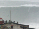 Brazilian surfer Carlos Burle rides a big wave at the Praia do Norte, north beach, at the fishing village of Nazaré in Portugal's Atlantic coast on Monday. Brazilian surfer Carlos Burle rides a big wave at the Praia do Norte, north beach, at the fishing village of Nazaré in Portugal's Atlantic coast on Monday.