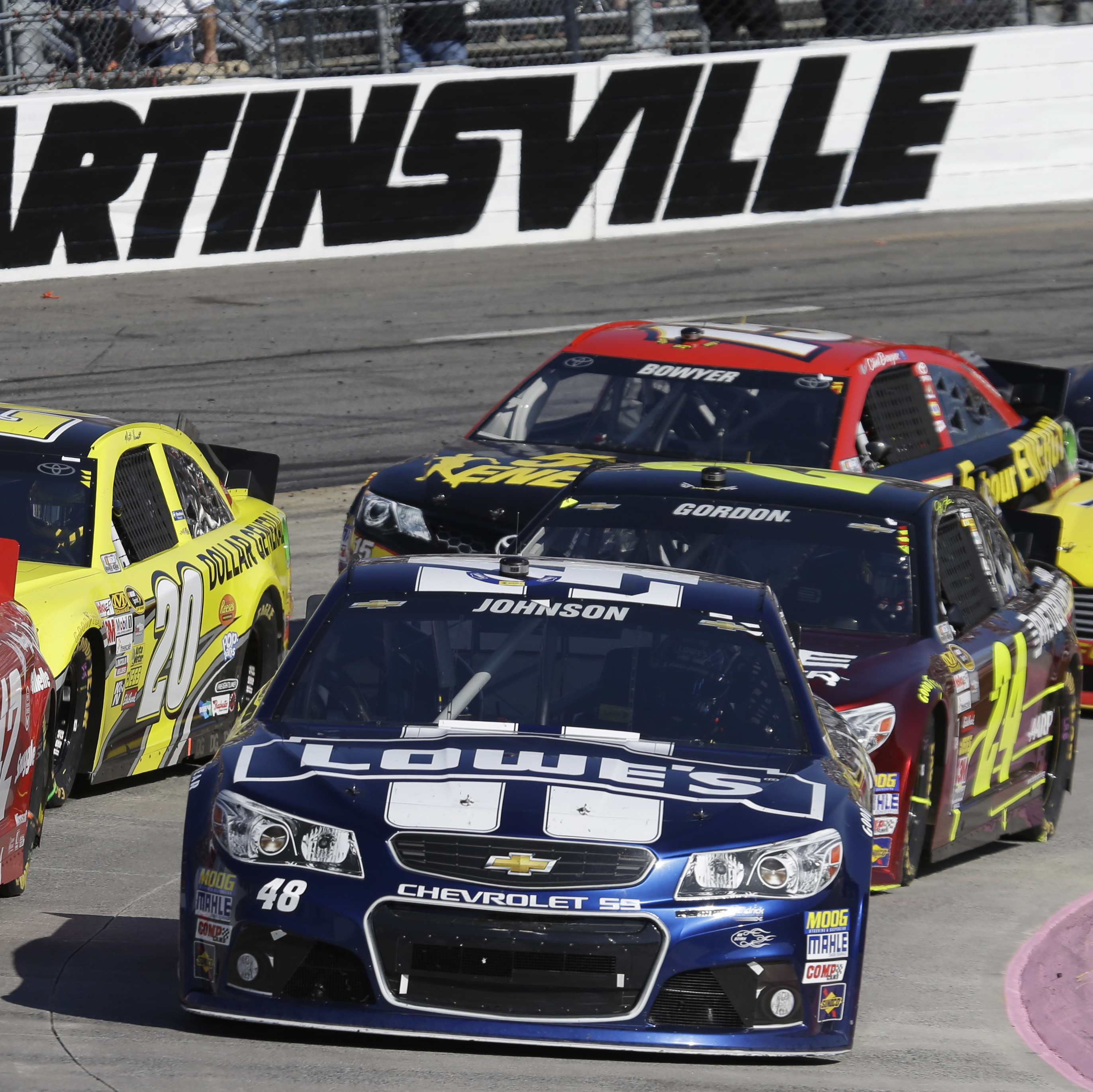 Sprint Cup Series driver Jimmie Johnson (48) and Juan Pablo Montoya ...