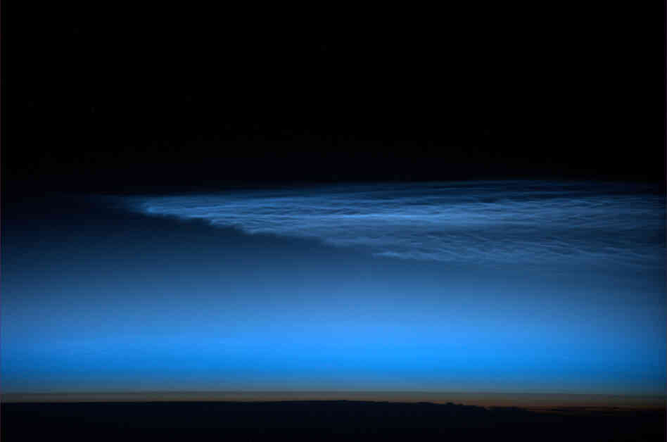 Unexpected noctilucent clouds.