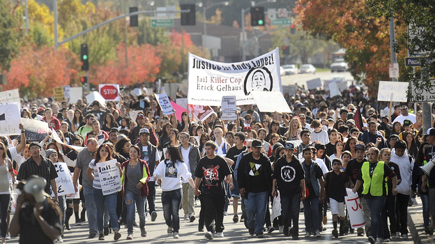 Hundreds of protesters march toward the Sonoma County Sheriff's Office in response to the death of Andy Lopez in Santa Rosa. (Image credit: Reuters/Landov)