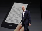 Amazon CEO Jeff Bezos unveils new Kindle reading devices during a 2012 news conference. Amazon CEO Jeff Bezos unveils new Kindle reading devices during a 2012 news conference.