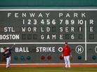 For Game 6, the World Series returns to Boston's Fenway Park, where the home team hasn't clinched a championship since 1918. Here, Red Sox players warm up in front of the Green Monster. For Game 6, the World Series returns to Boston's Fenway Park, where the home team hasn't clinched a championship since 1918. Here, Red Sox players warm up in front of the Green Monster.