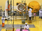 Scientists and engineers work on the Mars Orbiter at the Indian Space Research Organisation's satellite center in Bangalore, India, on Sept. 11. The spacecraft is scheduled to be launched sometime in the next three weeks. Scientists and engineers work on the Mars Orbiter at the Indian Space Research Organisation's satellite center in Bangalore, India, on Sept. 11. The spacecraft is scheduled to be launched sometime in the next three weeks.