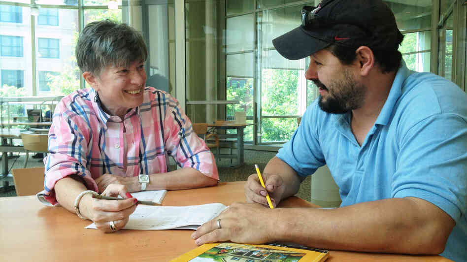 Marilyn Block tutors Jason White at a local library during a one-on-one session that is part of the Literacy Council of Montgomery County, in Maryland. Marilyn Block tutors Jason White at a local library during a one-on-one session that is part of the Literacy Council of Montgomery County, in Maryland.