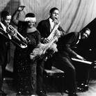 Ma Rainey Georgia Jazz Band posing for a studio group shot in the mid-1920s, with Thomas A. Dorsey at the piano. Ma Rainey Georgia Jazz Band posing for a studio group shot in the mid-1920s, with Thomas A. Dorsey at the piano.
