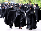 Iranian demonstrators march in Tehran in 2011, during a protest asking the government to intensify its enforcement of the Islamic dress code. Iranian demonstrators march in Tehran in 2011, during a protest asking the government to intensify its enforcement of the Islamic dress code.