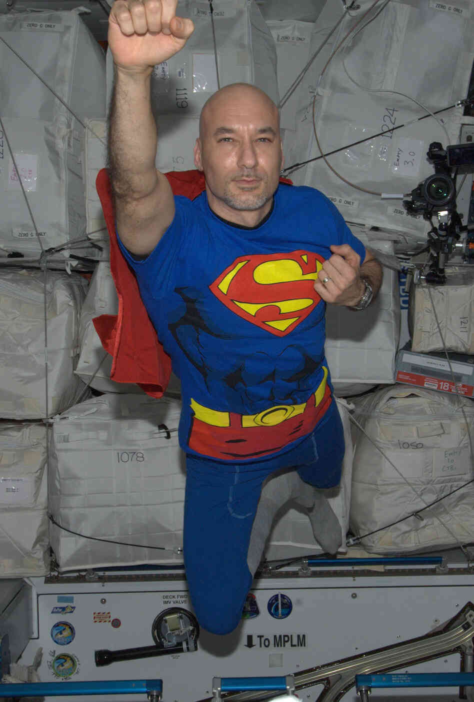 Parmitano soaring through space as Superman on Halloween.