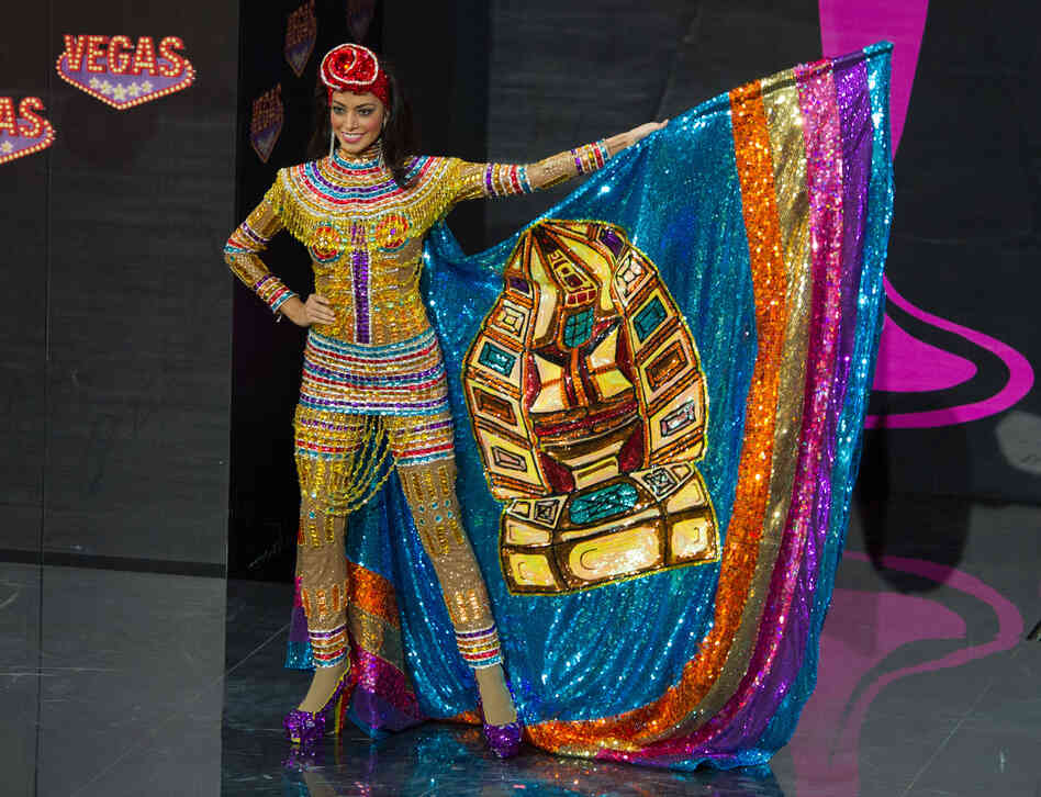 Alexia Viruez, Miss Bolivia, uses visual aids to explain the plot of her upcoming film about Darth Vader's brother Goldie.
