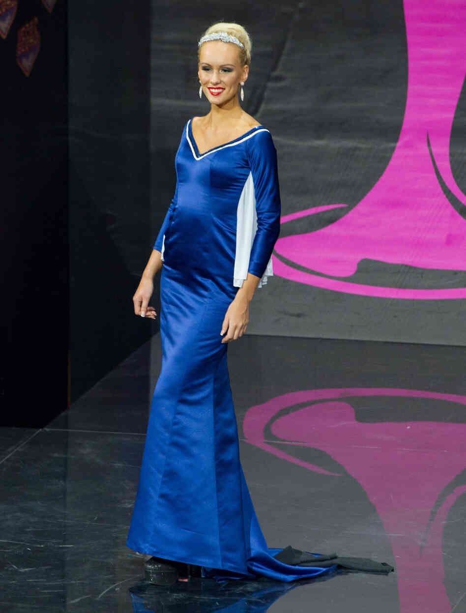She cannot believe Captain von Trapp is marrying that nun. (Miss Estonia: Kristina Karjalainen)
