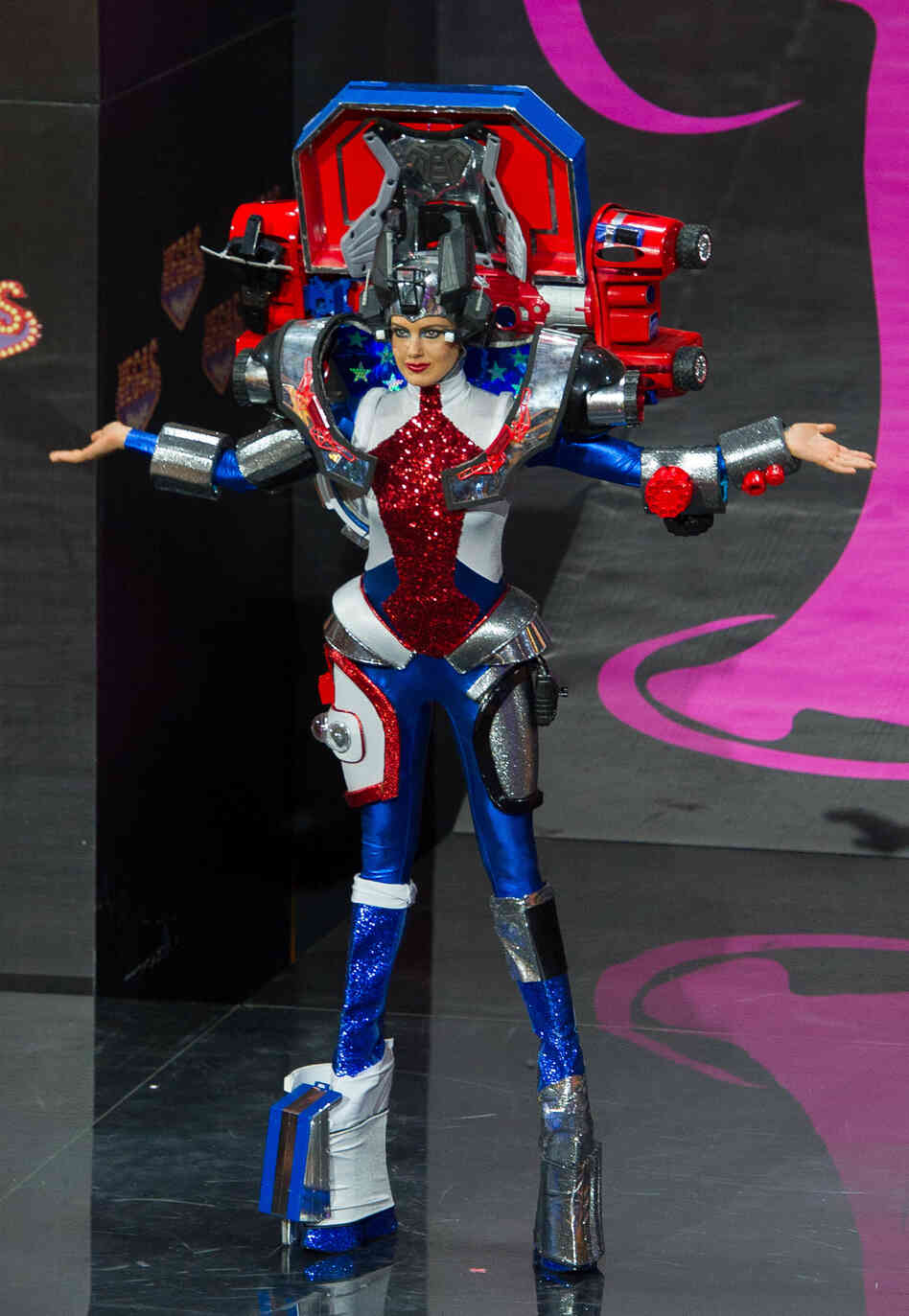 Uh-huh. This is us. Right here in the old US of A, where we have a long patriotic tradition of light-up robot toys and stealing Elton John's shoes. (Miss USA: Erin Brady)