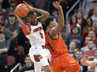 Louisville's Kevin Ware, in the white uniform, was back in action Wednesday night. He returned to the court for the first time since breaking his leg last spring. Louisville's Kevin Ware, in the white uniform, was back in action Wednesday night. He returned to the court for the first time since breaking his leg last spring.