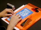 At a career fair in West Palm Beach, Fla., on Thursday, a job seeker collected information. At a career fair in West Palm Beach, Fla., on Thursday, a job seeker collected information.