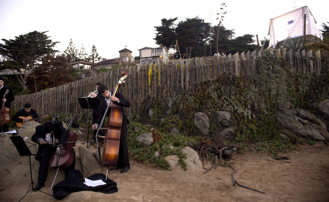 Musicians play Chilean music during the exhumation of the remains of Chilean poet Pablo Neruda in Isla Negra, some 75 miles west of Santiago, on April 8 , 2013. Officials say that tests show Neruda was not poisoned. Musicians play Chilean music during the exhumation of the remains of Chilean poet Pablo Neruda in Isla Negra, some 75 miles west of Santiago, on April 8 , 2013. Officials say that tests show Neruda was not poisoned.