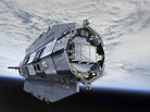 An artist's rendition of the GOCE satellite shows the craft in its orbit around Earth. After four years of studying oceans and gravity fields, GOCE re-entered the atmosphere over the Southern Atlantic Ocean Sunday night. An artist's rendition of the GOCE satellite shows the craft in its orbit around Earth. After four years of studying oceans and gravity fields, GOCE re-entered the atmosphere over the Southern Atlantic Ocean Sunday night.
