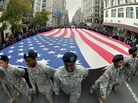 Members of the New York State National Guard march in the annual Veterans Day Parade on Fifth Avenue in New York Monday. The parade honored all veterans, with a special salute to women in uniform. Members of the New York State National Guard march in the annual Veterans Day Parade on Fifth Avenue in New York Monday. The parade honored all veterans, with a special salute to women in uniform.