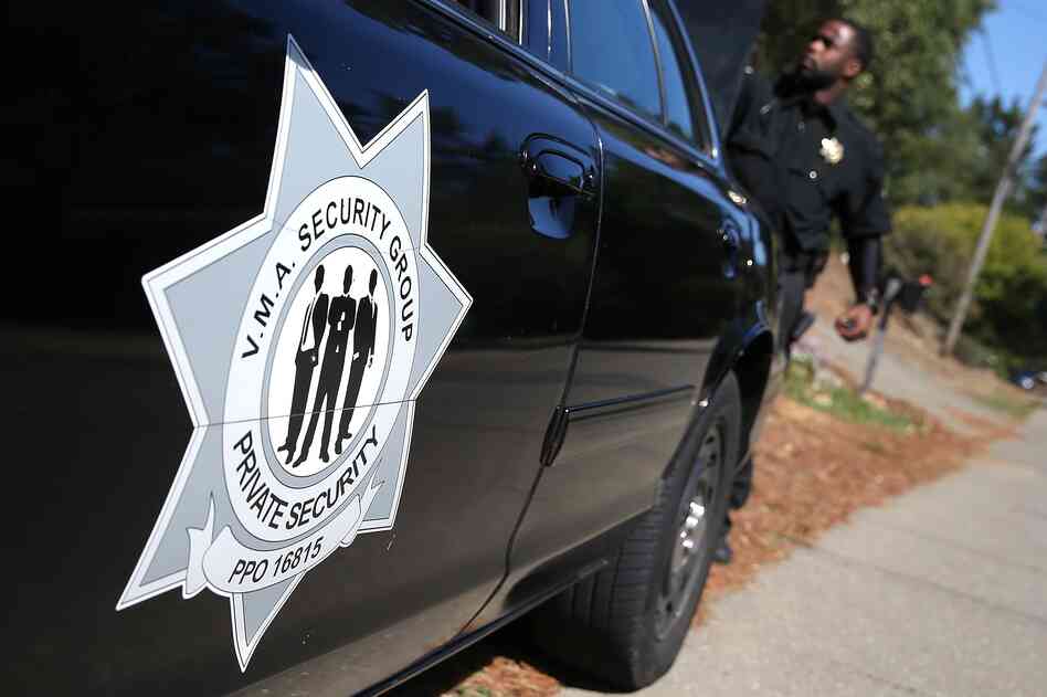 Security officer Steven Long patrols the Sequoyah Hills neighborhood in Oakland, Calif. With city police struggling to control crime, several neighborhoods have hired private security to patrol local streets. Security officer Steven Long patrols the Sequoyah Hills neighborhood in Oakland, Calif. With city police struggling to control crime, several neighborhoods have hired private security to patrol local streets.