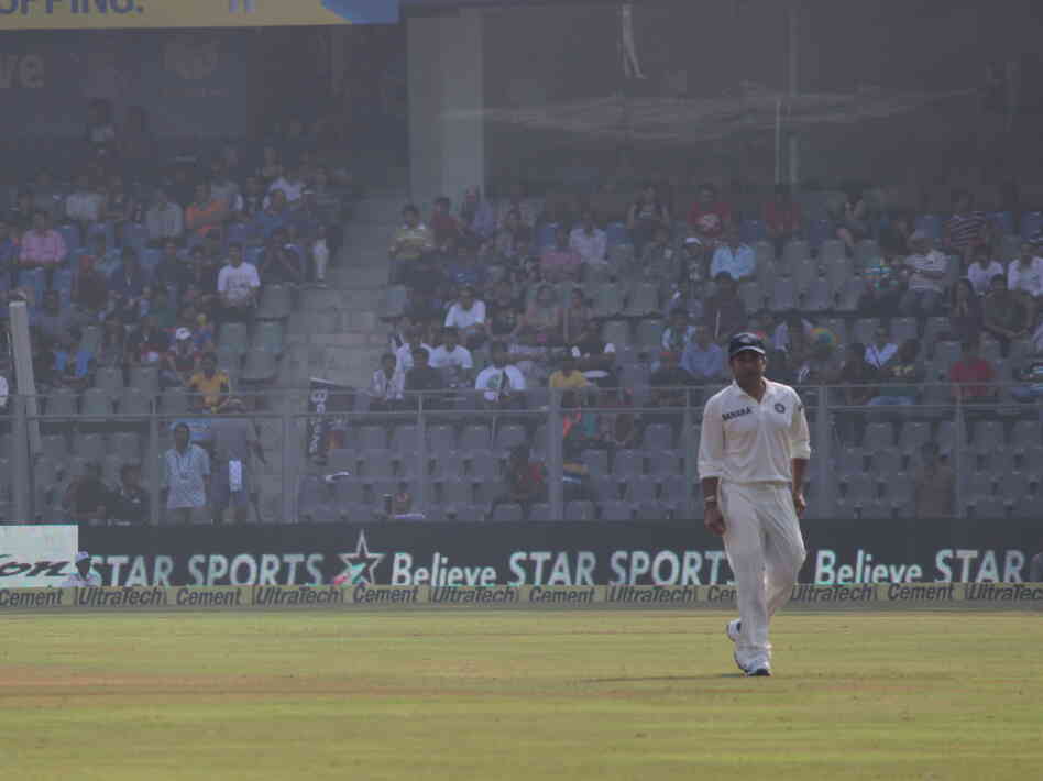 Sachin Tendulkar takes the field in his hometown of Mumbai on Thursday during his final cricket match playing for India. Sachin Tendulkar takes the field in his hometown of Mumbai on Thursday during his final cricket match playing for India.
