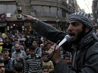A member of the Islamic State of Iraq and the Levant urges Syrians in the city of Aleppo to fight against the Assad regime. This week, the militants apologized for beheading a commander from another anti-Assad group. A member of the Islamic State of Iraq and the Levant urges Syrians in the city of Aleppo to fight against the Assad regime. This week, the militants apologized for beheading a commander from another anti-Assad group.
