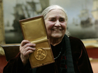 British author Doris Lessing (L) shows her prize insignia of the 2007 Nobel Prize in Literature at the Wallace Collection in London in 2008. British author Doris Lessing (L) shows her prize insignia of the 2007 Nobel Prize in Literature at the Wallace Collection in London in 2008.