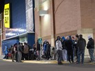 Customers wait in line Thursday at a Best Buy store in Richfield, Minn., to buy the PlayStation 4, which went on sale early Friday. Customers wait in line Thursday at a Best Buy store in Richfield, Minn., to buy the PlayStation 4, which went on sale early Friday.