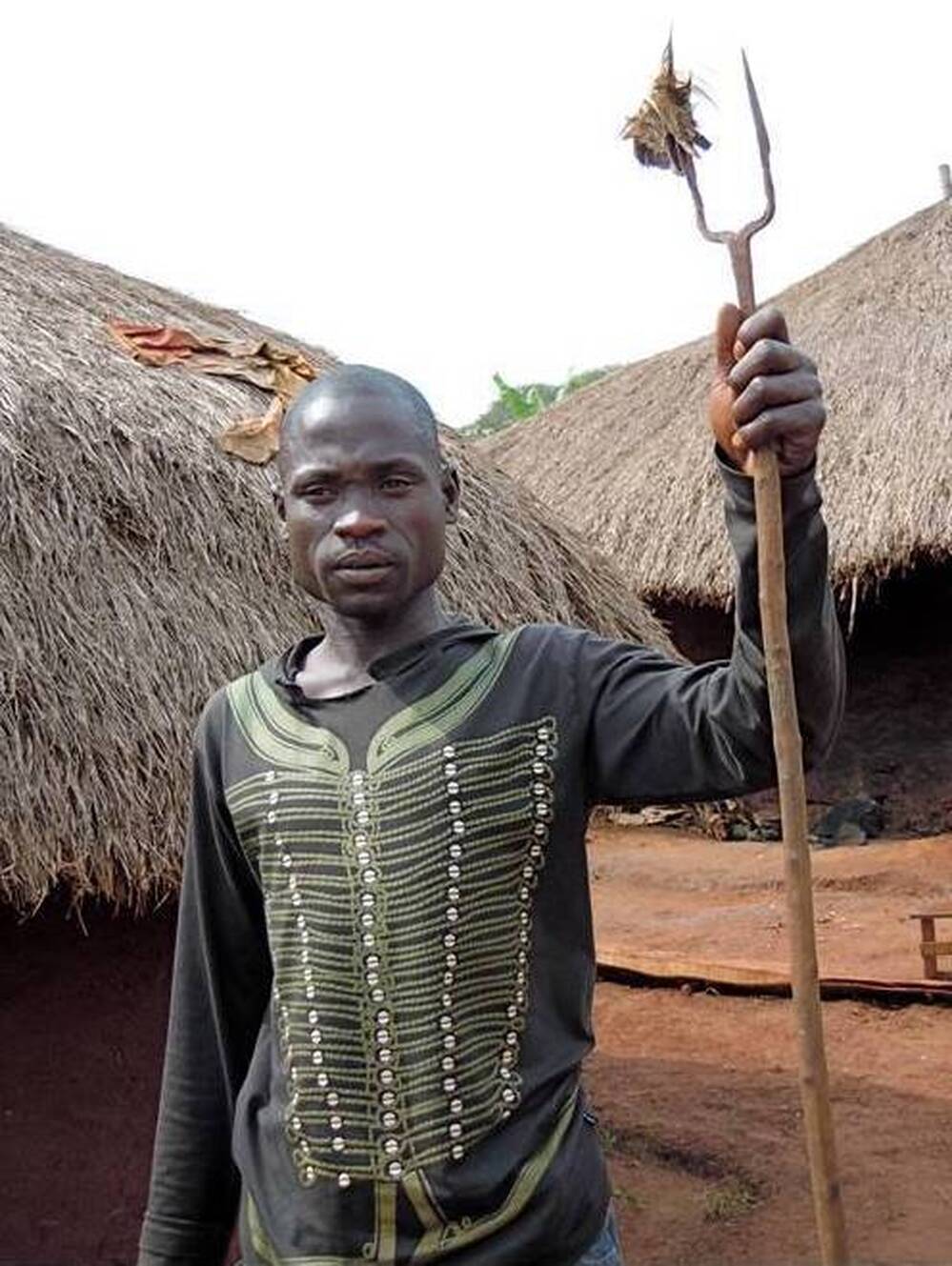 Yoset, a spiritual healer near Arua, Uganda, works with the Centers for Disease Control and Prevention to detect the plague in his village.