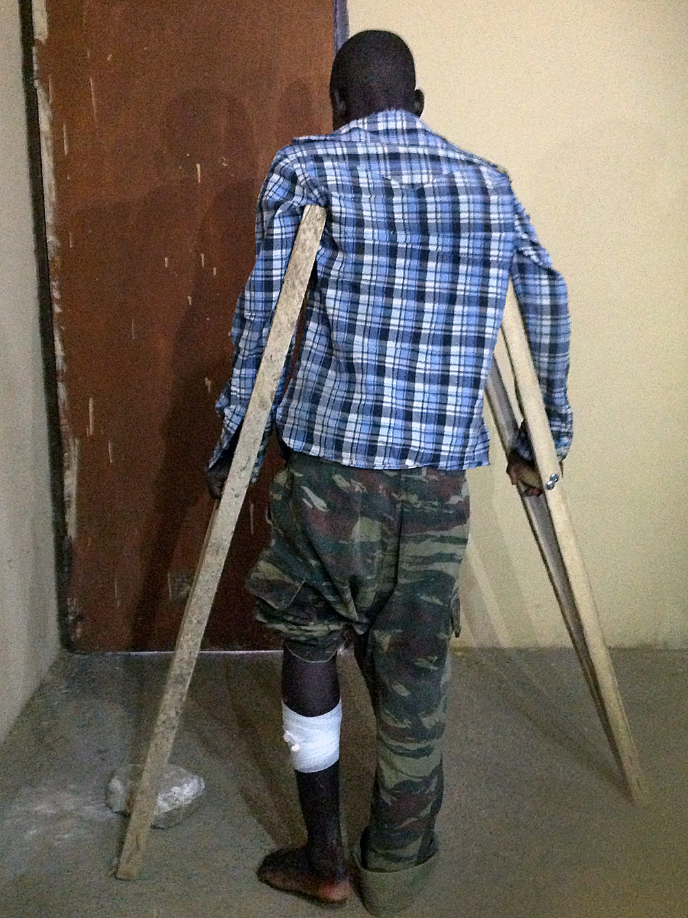 The Nigerian military identified this man as a former member of Boko Haram. He was captured after being hit in the leg by a bullet. The man says foreign fighters from neighboring Chad, Cameroon and Niger were among the insurgents in the Islamist rebellion, fueling fears that the violence could spread beyond Nigeria.