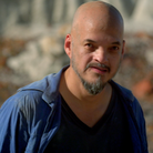Pixies guitarist Joey Santiago, shortly before exploding in the desert. Pixies guitarist Joey Santiago, shortly before exploding in the desert.